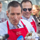 You can tell this Iowa State Fair pork chop tastes good because of how his mouth can’t close all the way.